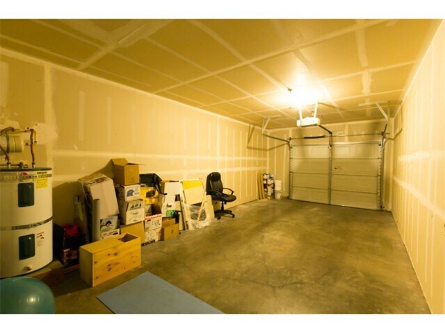 One car attached garage with plenty of storage space. - 10515 221st Lane Northeast