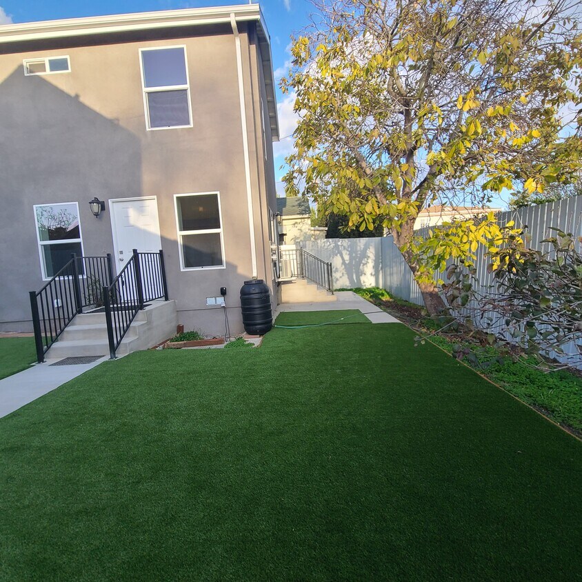 yard portion and back patio - 384 Hargrave St