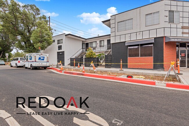 Building Photo - ~1 Month FREE~ Stunning and Bright One Bed...
