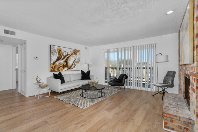 Living Room with Deck - Fox Run Apartments