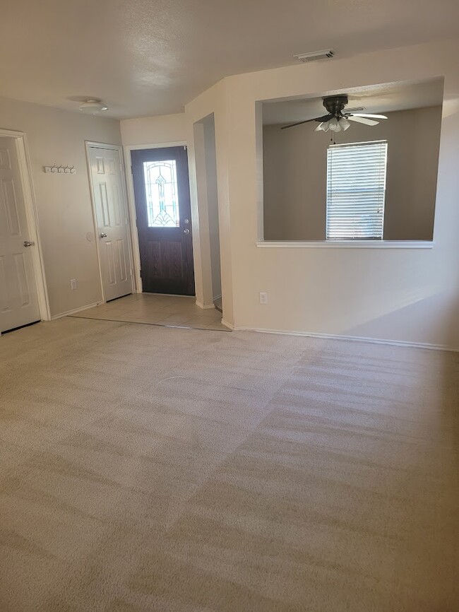 Formal Living and Dining , Guest bathroom to the right upon entry - 6535 Fairbrook Park Ln