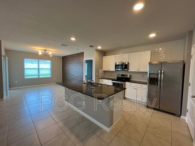 Foto del edificio - 5106 Fiddlewood Way