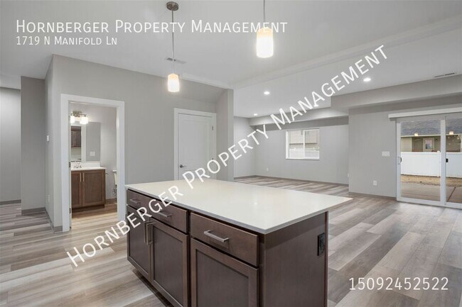 Foto del edificio - 1719 N Manifold Ln
