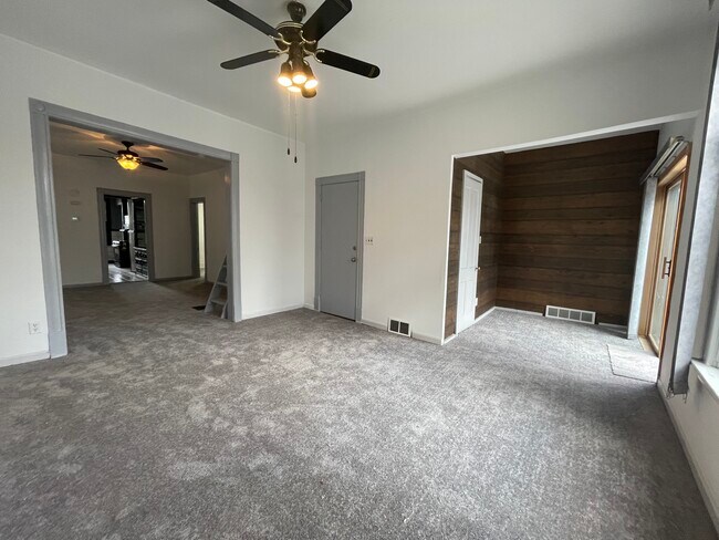 Living room and balcony access - 544 E Linus St