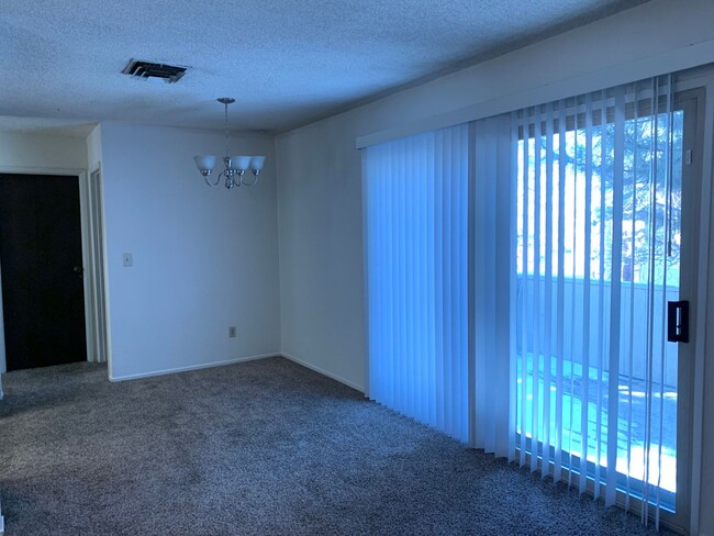 Building Photo - ENJOY THE POOL THIS SUMMER IN THIS GATED C...