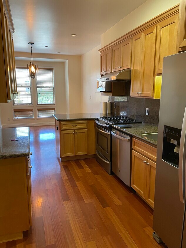 View of the living area from kitchen - 2577 Bryant St