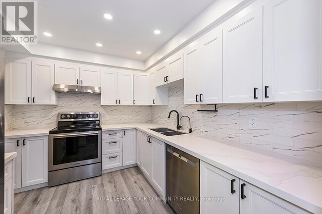 Building Photo - 2120-2120 Rathburn Rd E