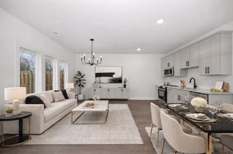 Stunning open-concept modern living and dining space with gourmet kitchen. - 2512 Freeman Rd SW