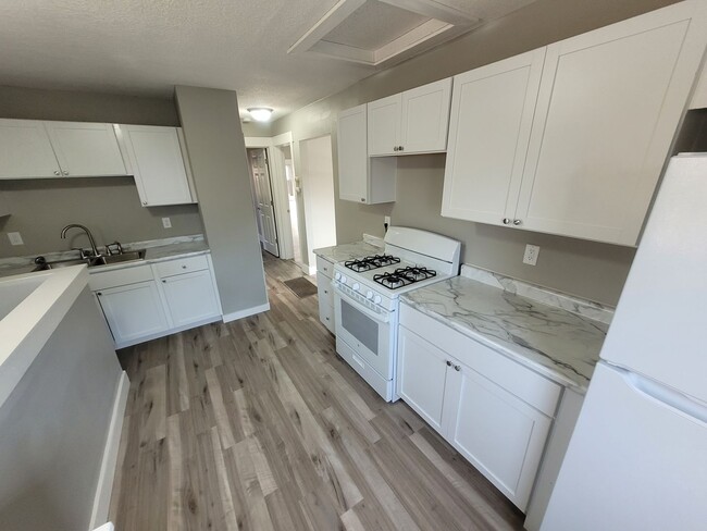 Building Photo - Renovated (in 2024!) two bedroom home, har...