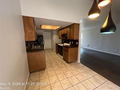 Building Photo - 7009 Woodhue Dr