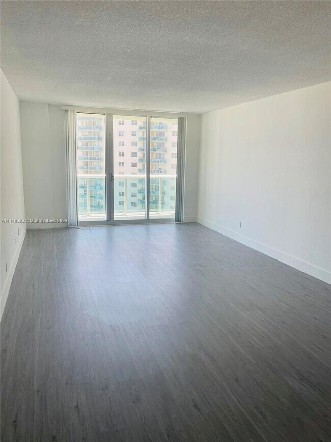 Building Photo - 19380 Collins Ave