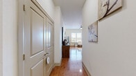 Located at 1333 Old Spanish Trail in Houston, TX, this single-story, 3-bedroom, 2-bathroom home offers a thoughtfully designed layout across a comfortable footprint. The entrance opens into a bright hallway with gleaming hardwood floors that extend through the main living areas, leading naturally toward the living room, which features a ceiling fan and ample natural light from large windows.

The kitchen is a standout space, showcasing rich dark wood cabinetry, dark granite countertops, a tile backsplash, and a full suite of stainless steel appliances, including a range, microwave, dishwasher, and refrigerator. An island provides additional prep space, and the kitchen flows seamlessly into the sun-drenched dining area, which is surrounded by large windows offering open views of the surrounding landscape.

The bedrooms are carpeted and well-proportioned, each with ceiling fans and natural light. The primary bedroom includes access to a spacious walk-in closet with built-in shelving and hanging rods. The bathrooms are finished with tile flooring, dark wood vanities, white countertops, and well-lit mirrors. Additional spaces include a utility room, laundry room, pantry, and four closets, providing exceptional storage throughout.