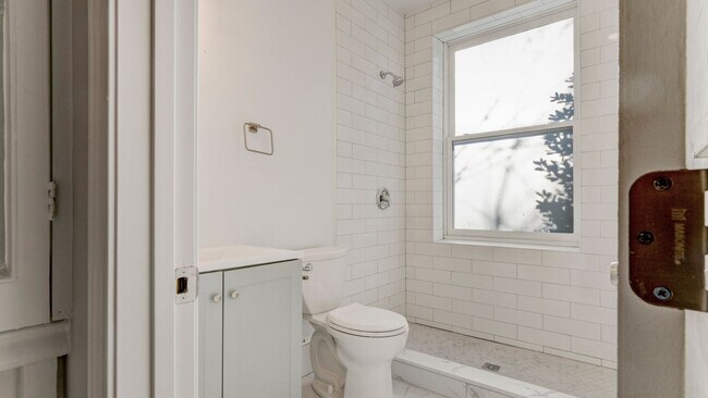 Photo - Spacious 4-Bedroom, 2-Bathroom Apartment i...