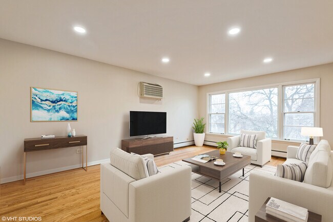 Foto del edificio - 5911 W Leland Ave