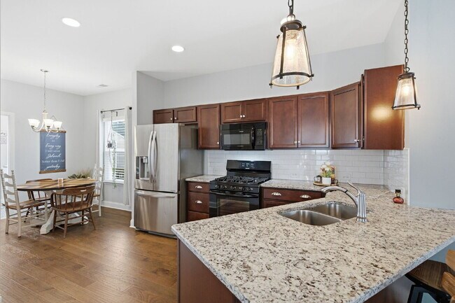 Building Photo - Zoned for the highly-rated Liberty Creek schools with resort-style amenities!