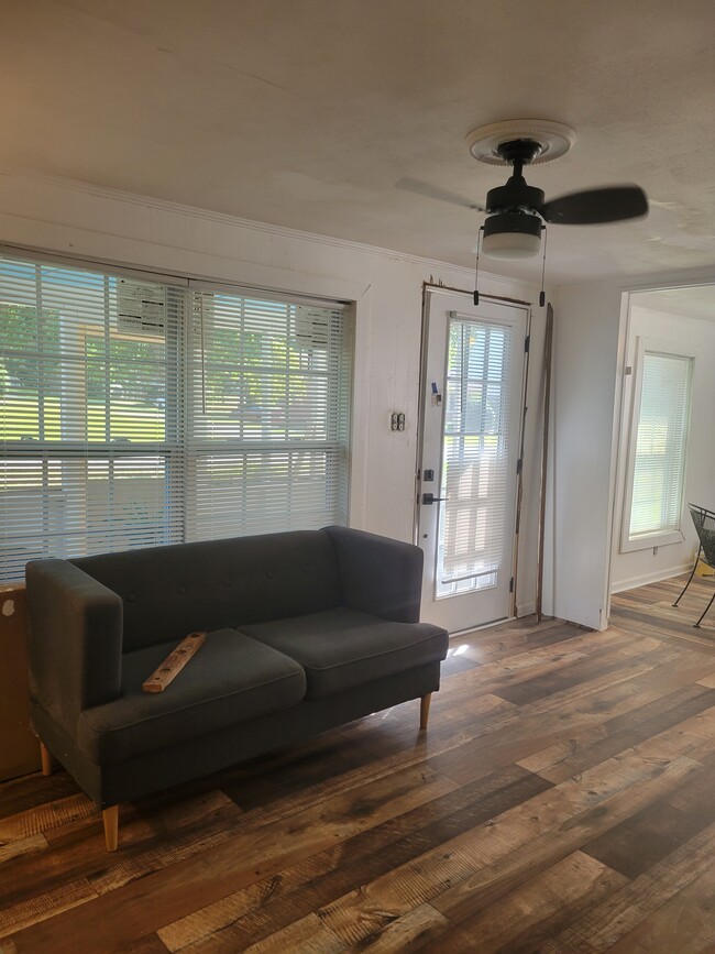 Cozy Livingroom with tons of natural light. - 134 E Trilby St