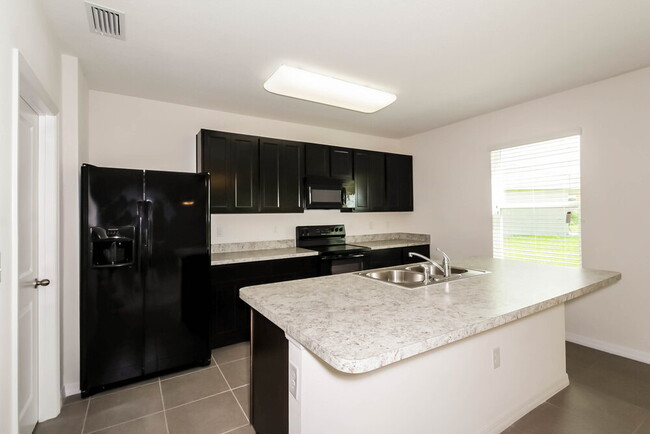 Foto del edificio - 15208 Agave Grove Pl