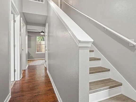 Entryway photo. Extra storage located in a closet under stairs. - 7060 Heather Oaks Dr