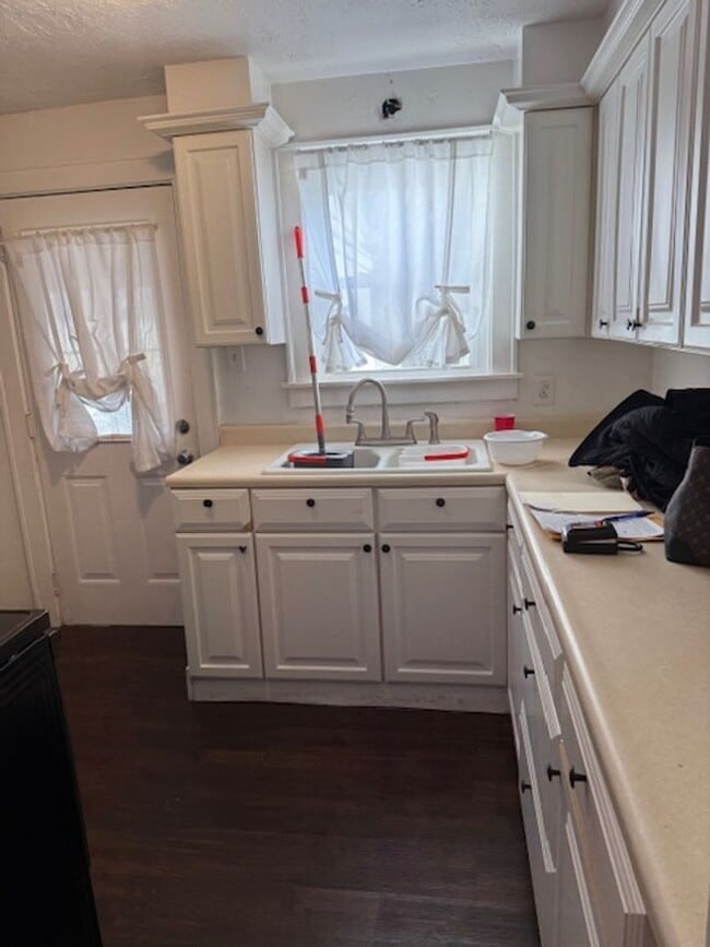 Building Photo - Make this your home 4Bedroom 2 bath home with one car garage $1530 per month