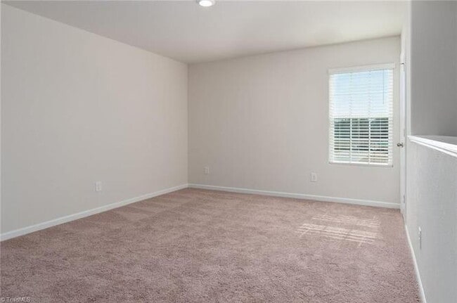 Photo - Spacious 3-Bedroom + Loft Home in Meredith Woods – Stylish, Efficient, and Perfect for Entertaining!