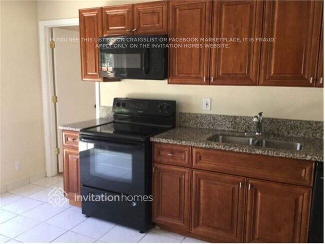 Foto del edificio - 6117 Blue Grass Cir