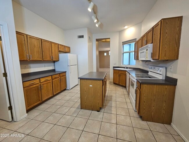 Foto del edificio - 9718 W Purdue Ave