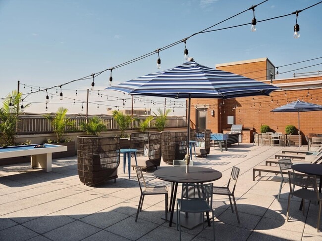 Take in the view from the rooftop terrace at The Metropolitan at 40 Park apartments near New York City. - The Metropolitan at 40 Park
