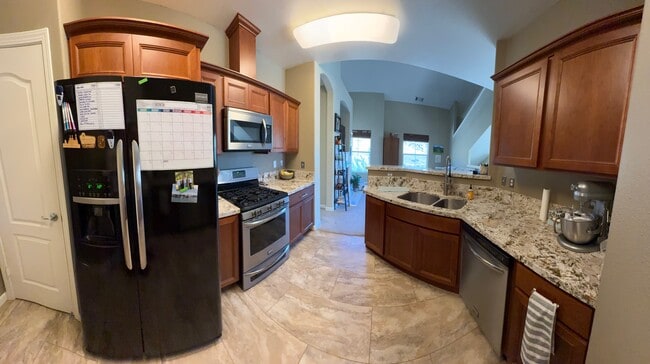 Nueva cocina de madera de cerezo y granito. - 9050 Double R Blvd