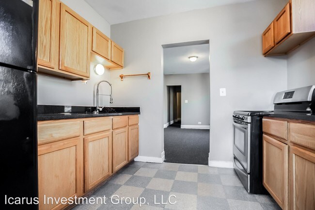 Foto del edificio - 7001-7007 S Merrill Ave