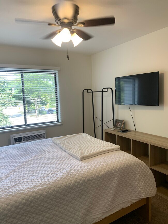 Bedroom with TV - 131 E Park Ave