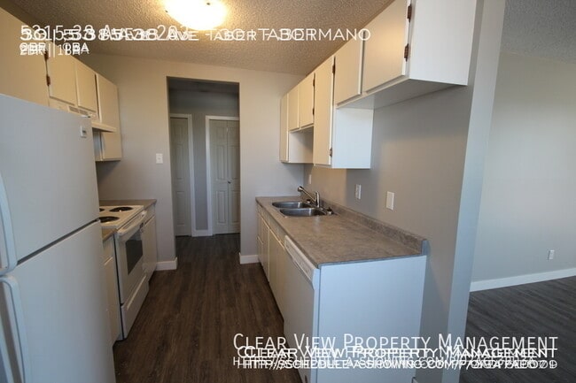 Building Photo - ? Beautifully Renovated 2-Bedroom Suite in Taber Manor!??Showings available at (647) 901-0141??