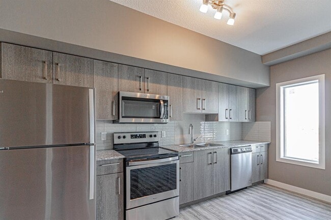 Building Photo - 4641-2128 128 Ave NE