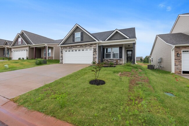 Building Photo - Lovely 3 BR, 2.5 BR Home with 2 Car Garage...
