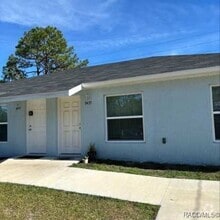 Building Photo - 9435 N Travis Dr
