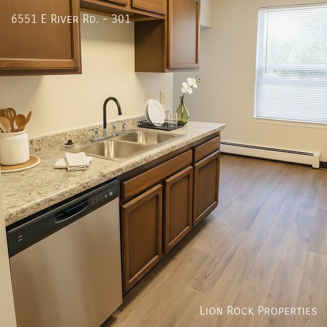 Building Photo - 6551 E River Rd