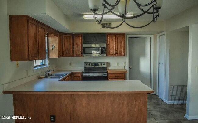 Foto del edificio - 8140 Wakefield Ave