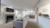 Located at 1010 N Ridge Rd in Wichita, Kansas, this well-appointed one-bedroom, one-bathroom residence offers a thoughtfully designed single-floor layout. The open-concept living and kitchen area serves as the heart of the home, anchored by a classic fireplace with a clean mantel surround and recessed lighting overhead. Large windows and a glass-paned exterior door allow natural light to pour in, creating a bright and welcoming atmosphere. Soft carpeting throughout the living area adds warmth and comfort underfoot.

The kitchen features white cabinetry with warm wood trim accents, grey laminate countertops, and full appliances including a range and over-the-range microwave. Stone-look tile flooring ties the space together neatly.

The spacious bedroom offers a comfortable retreat with corner windows that invite natural light, plush carpeting, and access to a dedicated closet for ample storage. The full bathroom includes a tub-shower combination, a vanity with countertop space, and stone-look tile flooring. A dedicated in-unit laundry area rounds out the practical amenities, adding everyday convenience to this well-rounded Wichita residence.