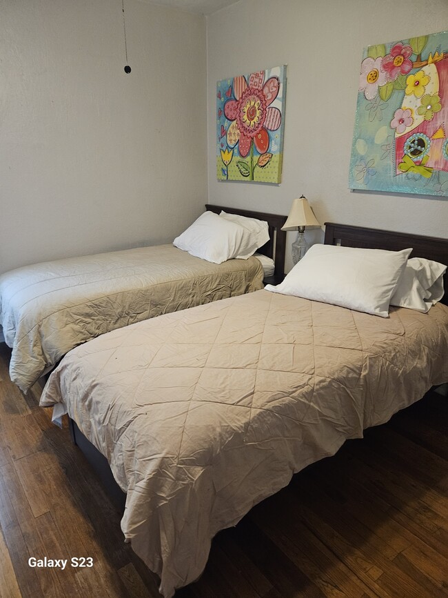 Bedroom double beds with small dresser - 160 S Fourth St