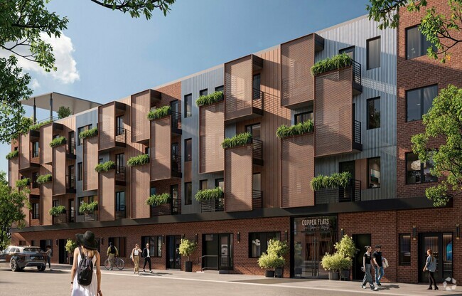 Entrance featuring large outdoor balconies and corten steel design - Copper Flats