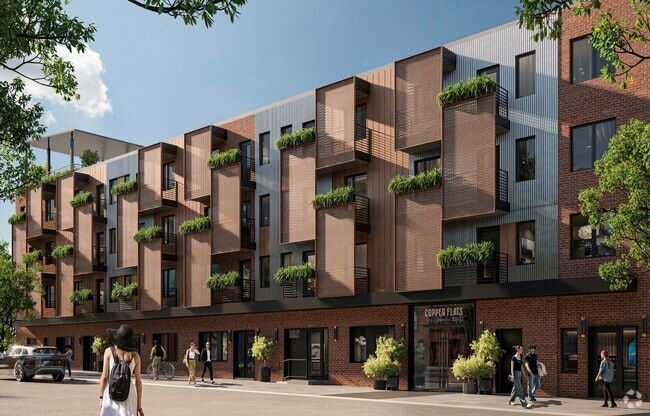 Stylish balconies shaded by corten steel sun screens - Copper Flats