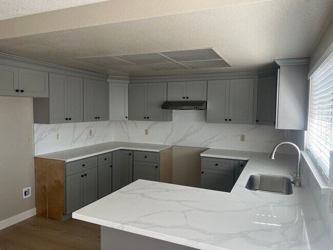 Building Photo - Spacious & Updated 4BD/2.5BA Home in Prime...