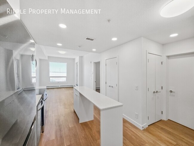 Photo du bâtiment - MODERN 1-BED CONDO | BELVEDERE PREMIER LIVING | SLEEK FINISHES