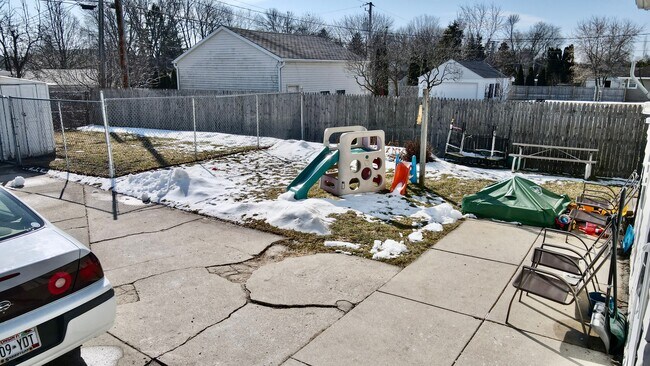 Fenced-In Yard with Plenty of Room for BBQ and Play Area - 2507 N 23rd St