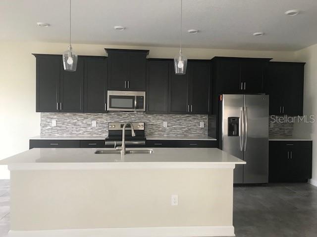 Foto del edificio - 15061 Evergreen Oak Loop
