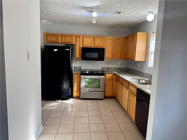 Foto del edificio - 5663 Windfall Ln
