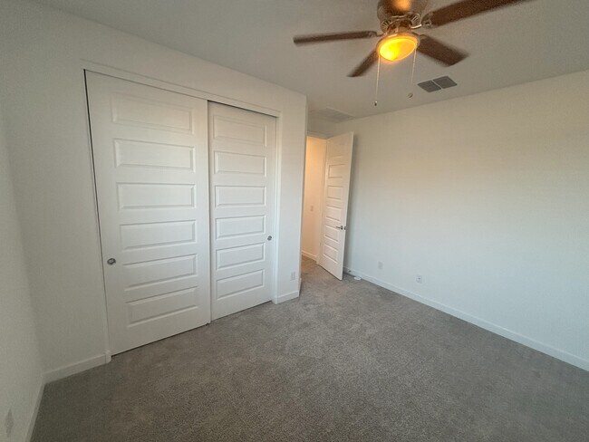 guest bedroom closet - 12350 W Wagon Wheel Dr