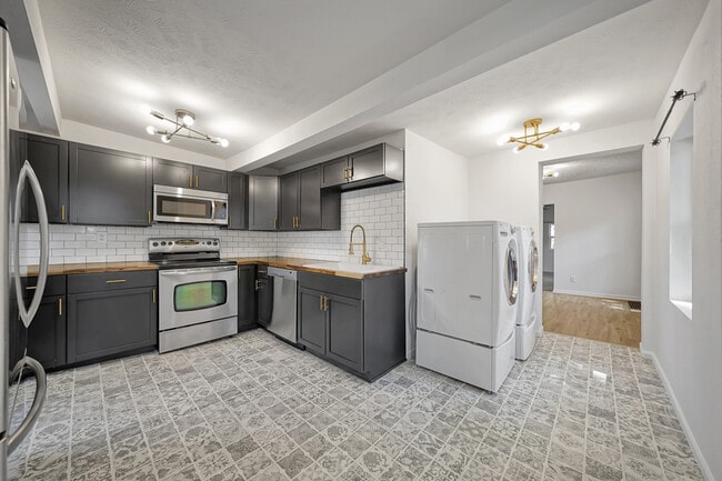 Building Photo - 4209 Touzalin Ave