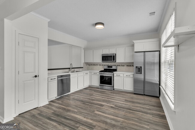 Building Photo - 9155 Nesbit Ferry Rd