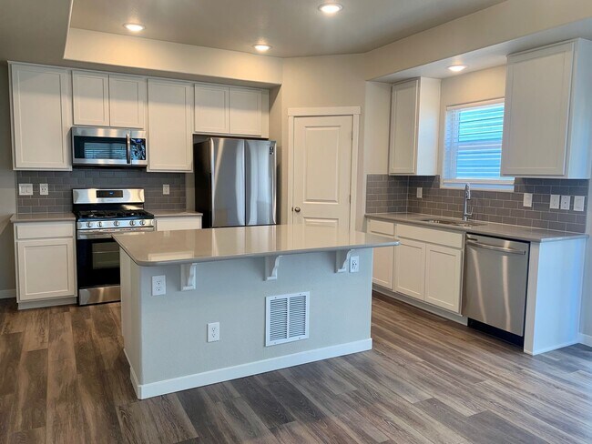 Building Photo - BUILT IN 2021 4 BEDROOM HOME LOCATED in th...