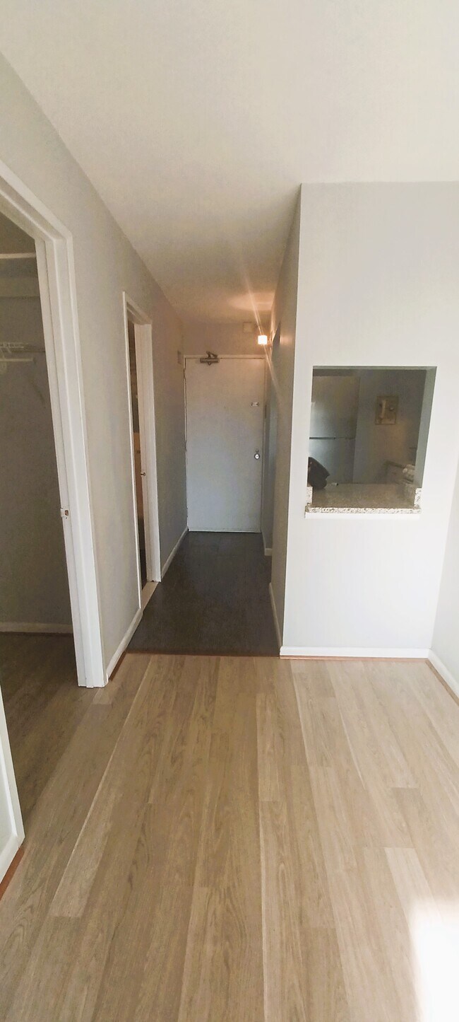 hallway to kithchen, bathroom and walk-in closet - 2939 Van Ness St NW